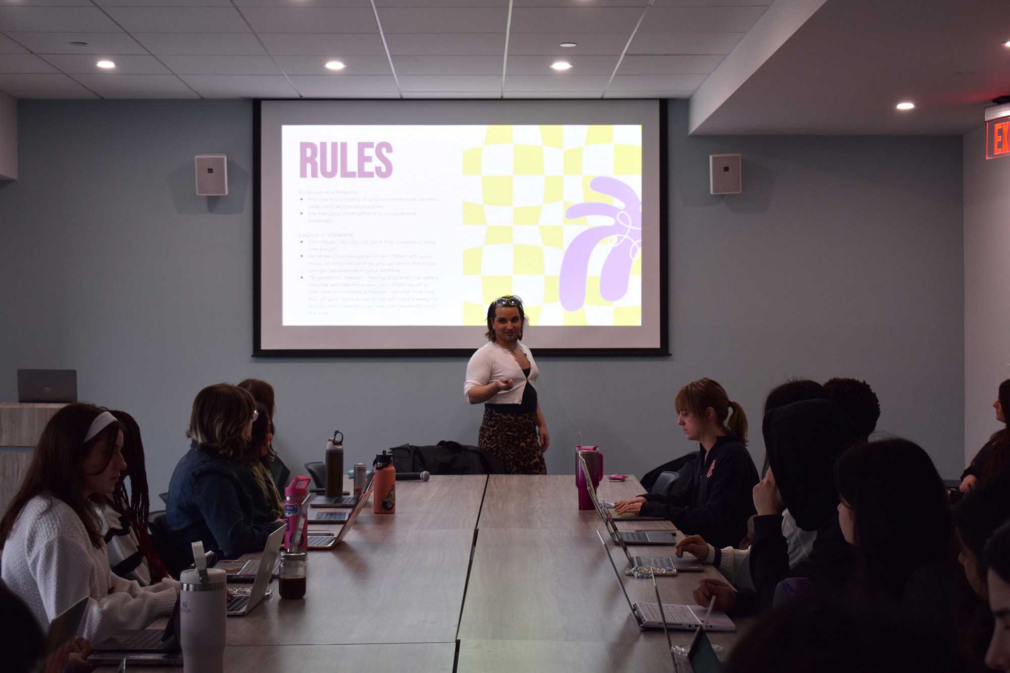 A Career counselor sharing the rules to students in a presentation